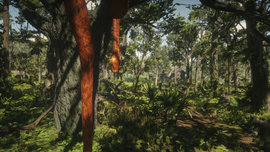 The giant snake in a tree outside Pleasance in RDR2. The town's schoolhouse can just be seen in the background, through the trees.