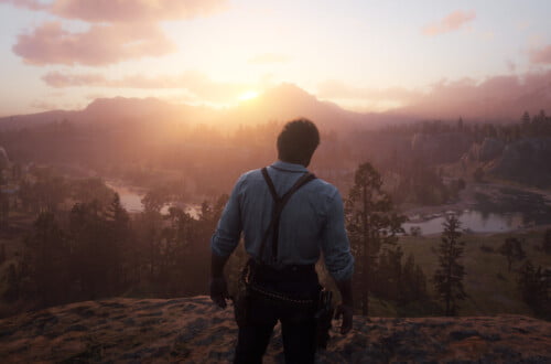 Arthur Morgan watching the sunset from the cliff edge at Horseshoe Overlook.