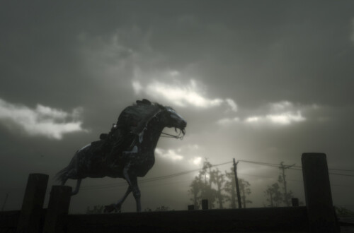 John Marston galloping on a dapple gray pinto Missouri Fox Trotter under a stormy gray sky.