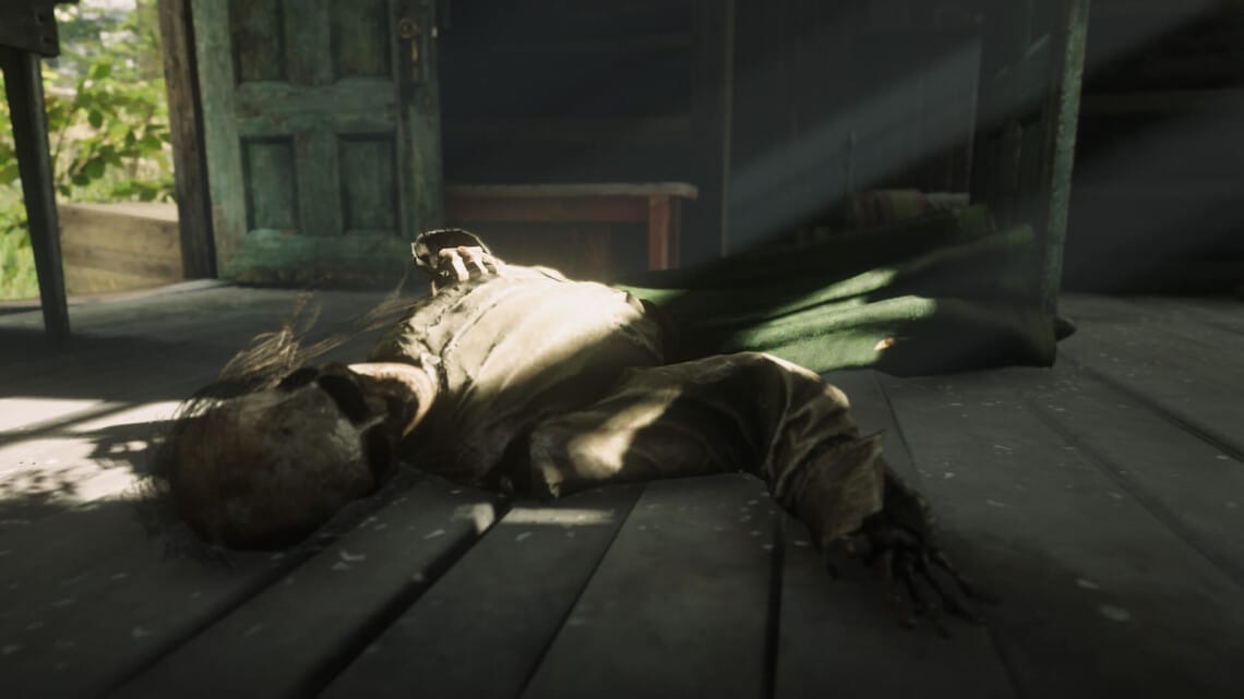 A skeleton that was once a woman named Martha. She lies on the floor of her cabin, clutching her chest.