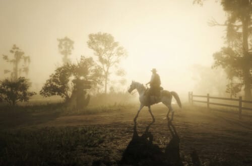Arthur Morgan riding a white Arabian horse outside Hagan Orchards. The light is misty and golden. He's looking away from camera, down the road to his right, where the light is brightest.