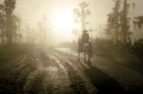 Arthur Morgan riding on a white Arabian down a muddy road towards the rising sun.